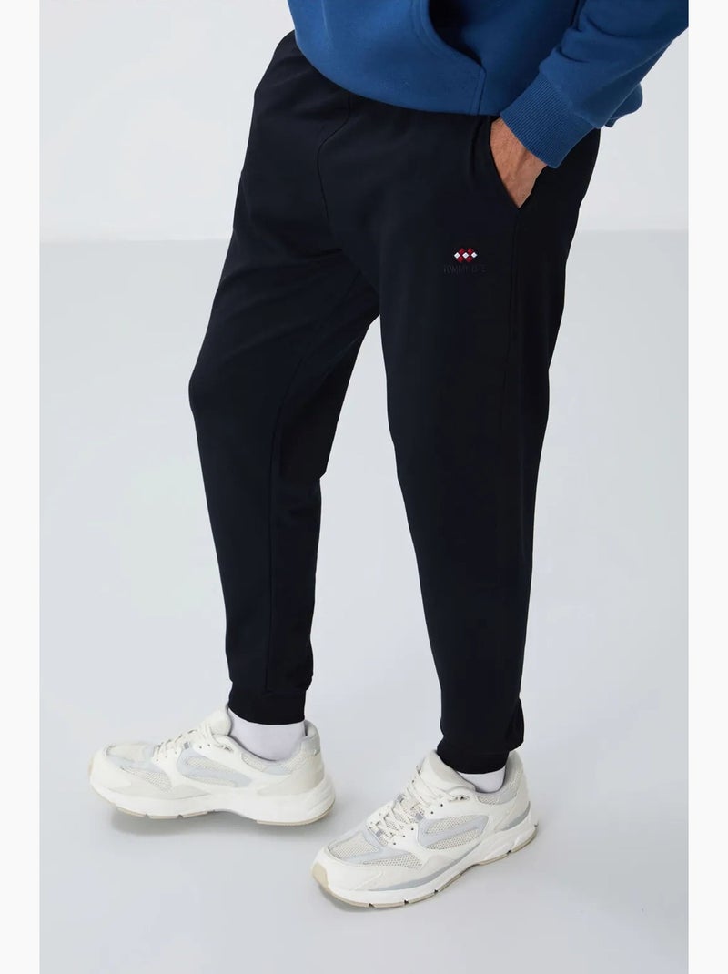 Men's calças de fato de treino em polar liso tommy Azul-lago - Kiabi