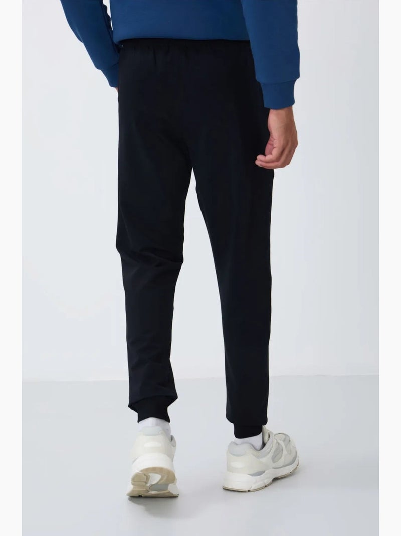 Men's calças de fato de treino em polar liso tommy Azul-lago - Kiabi
