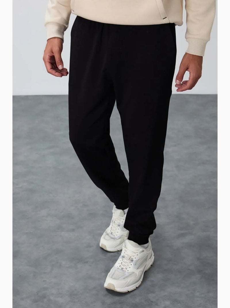 Men's calças de fato de treino em polar liso tommy Preto - Kiabi