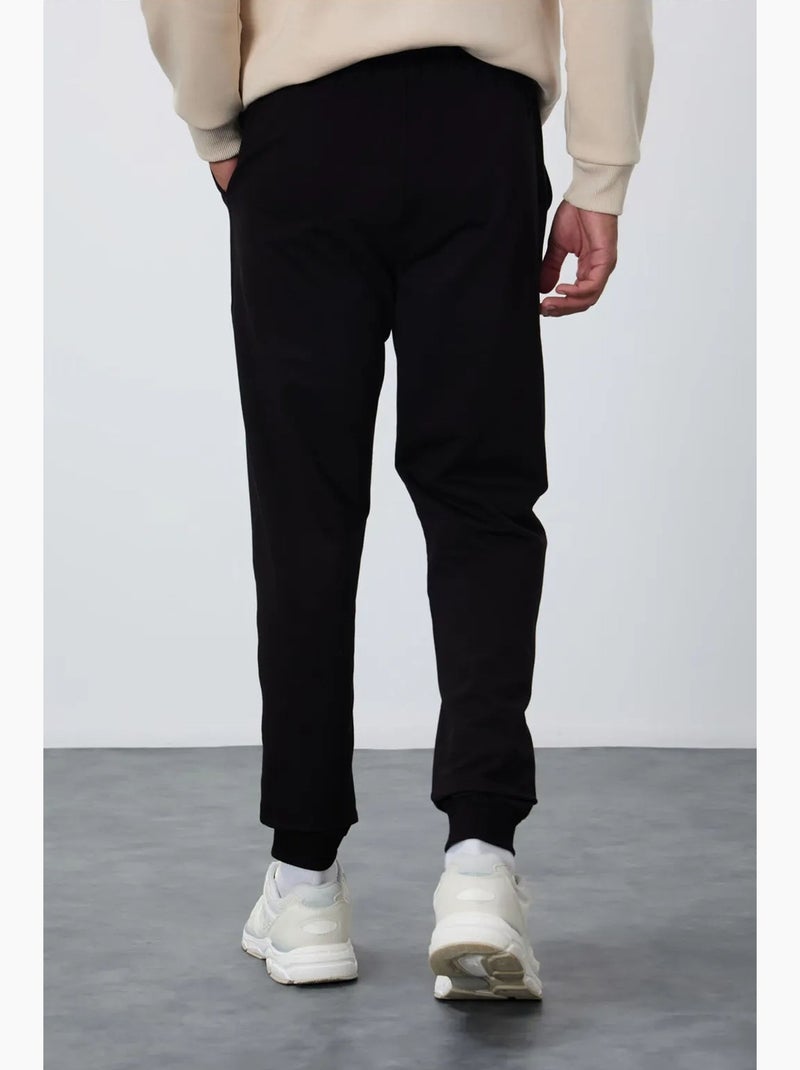 Men's calças de fato de treino em polar liso tommy Preto - Kiabi