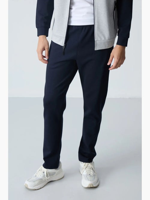 Men's conjunto active em malha com blocos de cor tommy - Kiabi Men's conjunto active em malha com blocos de cor tommy - Kiabi