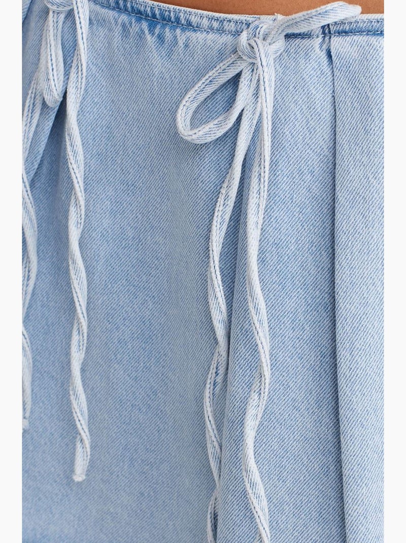 Minissaia em a em ganga de algodão com detalhe de laço dilvin Azul claro - Kiabi