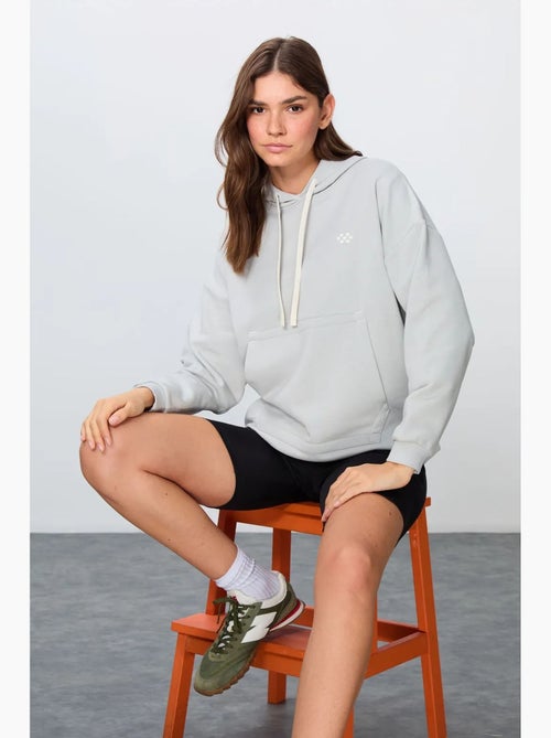 Moletom com capuz oversized e bolso tommy - Kiabi Moletom com capuz oversized e bolso tommy - Kiabi