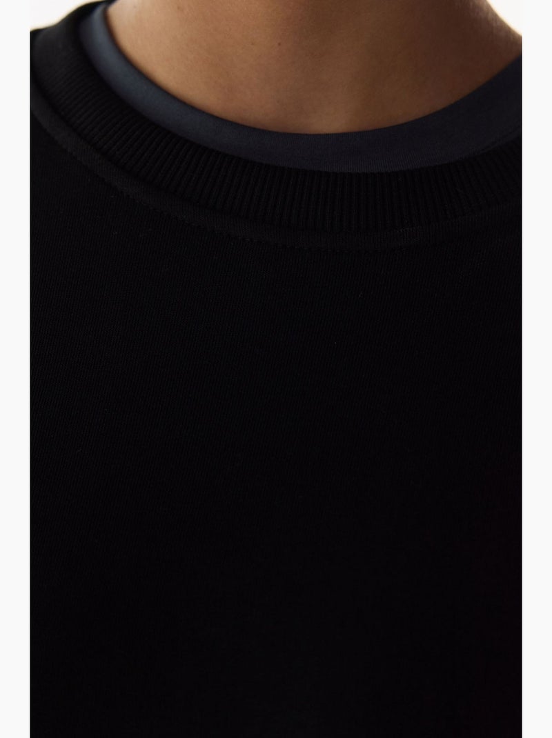 Moletom oversized feminino com gola redonda penti Preto - Kiabi