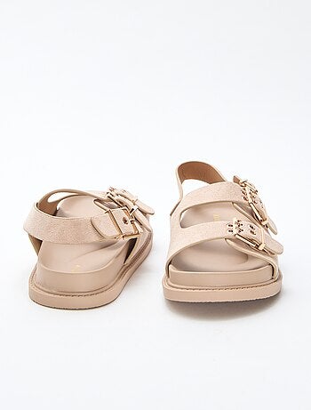 Mules em camurça com tiras ajustáveis atrás