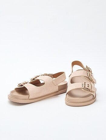 Mules em camurça com tiras ajustáveis atrás