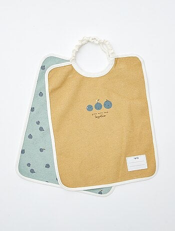 O lote de 2 babetes com decote elástico