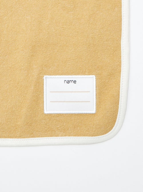 O lote de 2 babetes com decote elástico - Kiabi