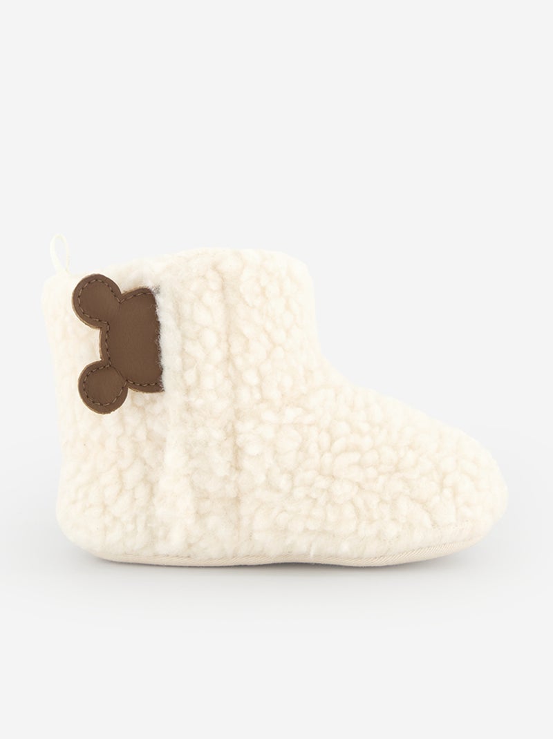 Par de pantufas 'Disney' em material tipo carneiro Branco - Kiabi
