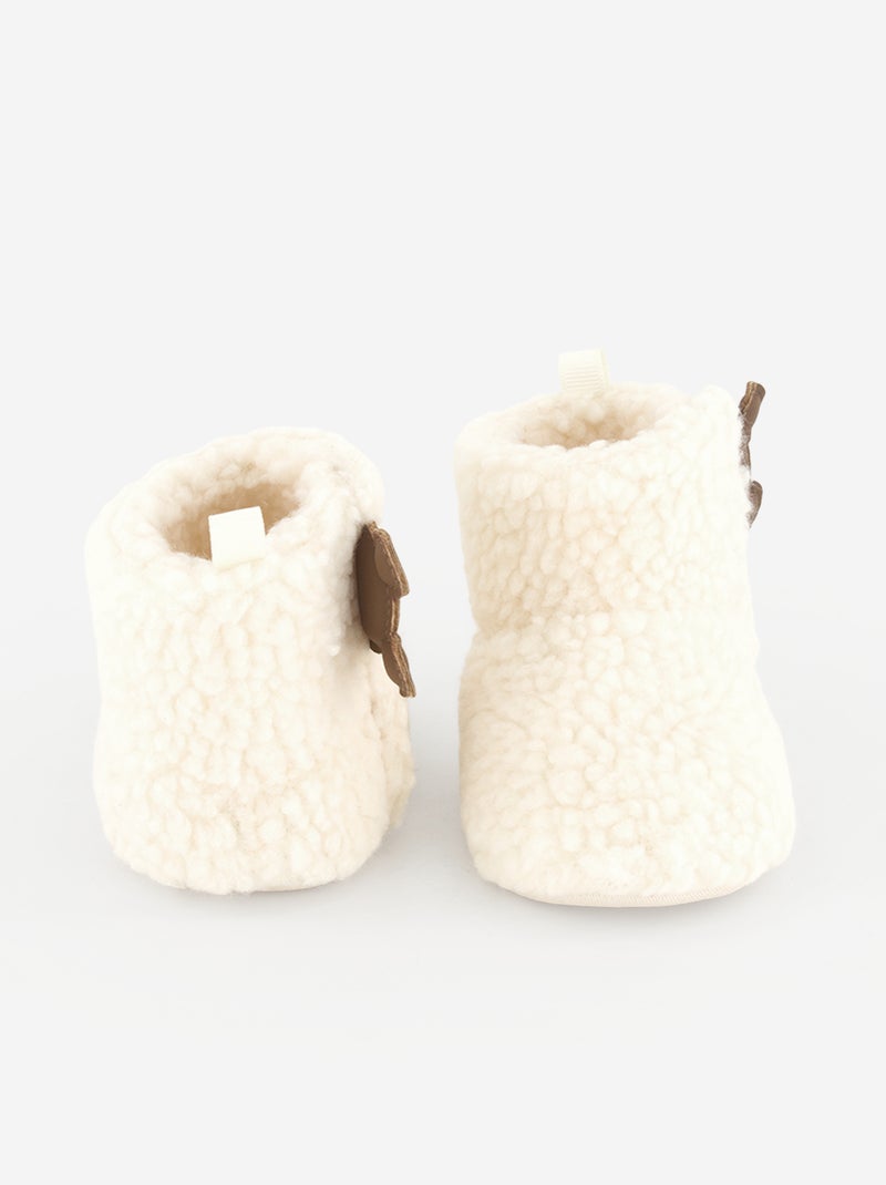 Par de pantufas 'Disney' em material tipo carneiro Branco - Kiabi