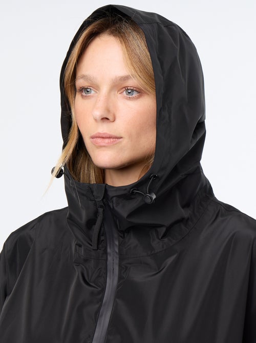 Parka comprida repelente de água com capuz - Kiabi Parka comprida repelente de água com capuz - Kiabi