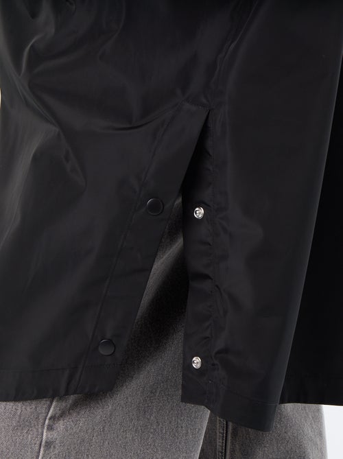 Parka comprida repelente de água com capuz - Kiabi Parka comprida repelente de água com capuz - Kiabi