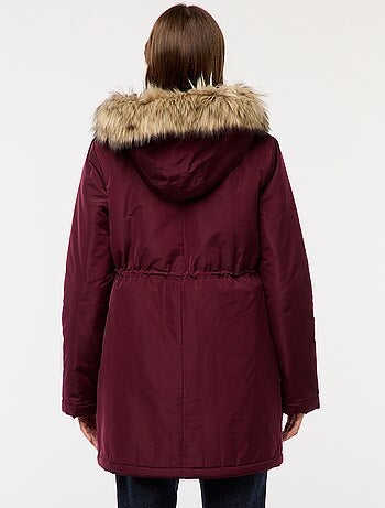 Parka de maternidade com detalhe de transporte de bebê
