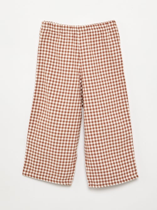 Pijama de 2 peças em flanela - Parte de cima abotoada + calças - Kiabi Pijama de 2 peças em flanela - Parte de cima abotoada + calças - Kiabi