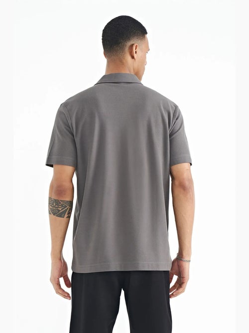 Polo algodão com estampa texto tommy - Kiabi Polo algodão com estampa texto tommy - Kiabi