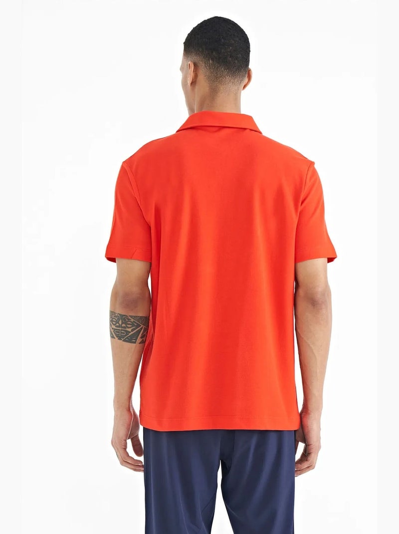 Polo algodão com estampa texto tommy Laranja - Kiabi
