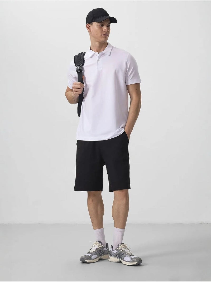 Polo algodão elastano tommy Branco - Kiabi
