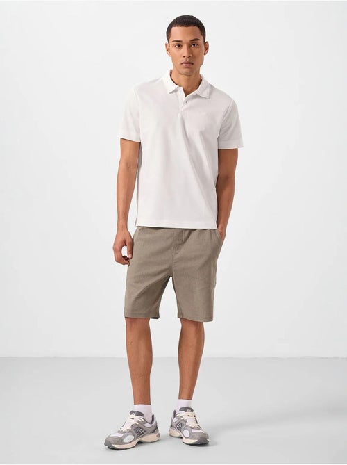 Polo algodão elastano tommy - Kiabi Polo algodão elastano tommy - Kiabi