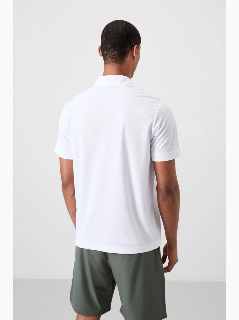 Polo com botões tommy Branco - Kiabi
