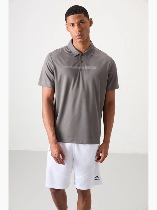 Polo com botões tommy - Kiabi Polo com botões tommy - Kiabi