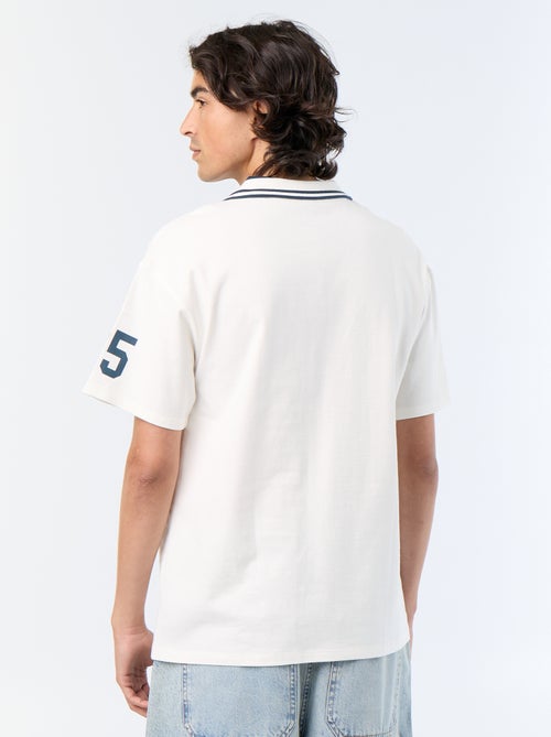 Polo com inscrições bordadas de manga curta - Kiabi