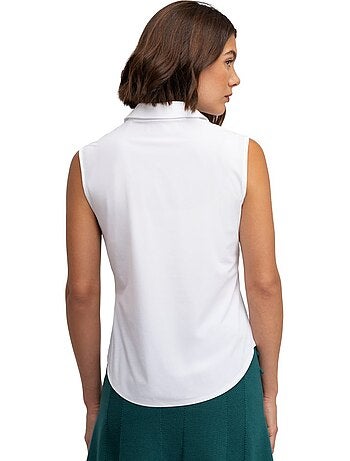 Polo de golfe performance sem mangas para mulher