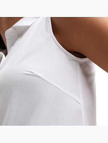 Polo de golfe performance sem mangas para mulher
