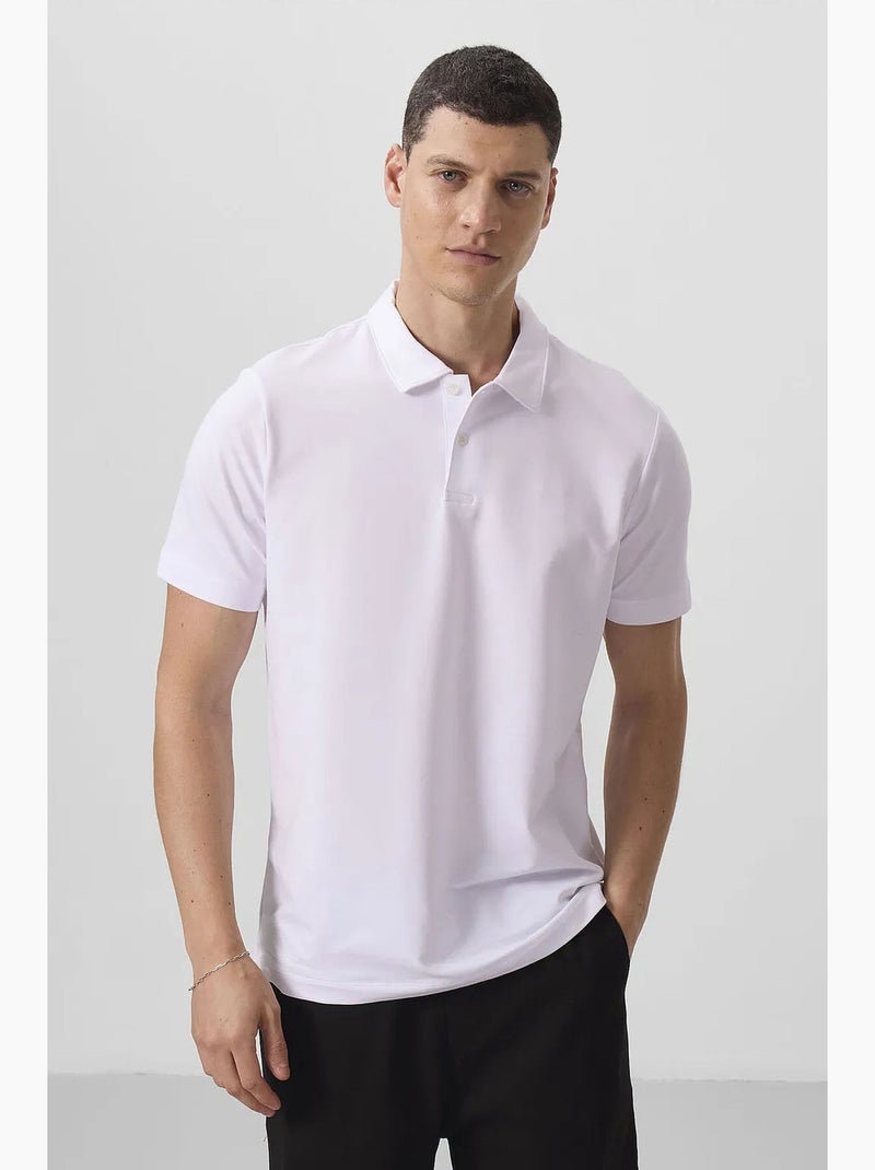 Polo de homem em algodão e elastano tommy Azul-marinho - Kiabi