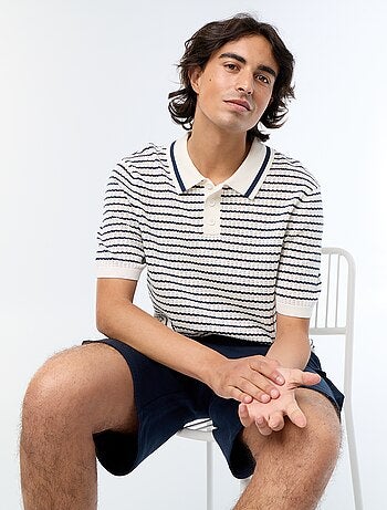 Polo de manga curta em malha ajurada