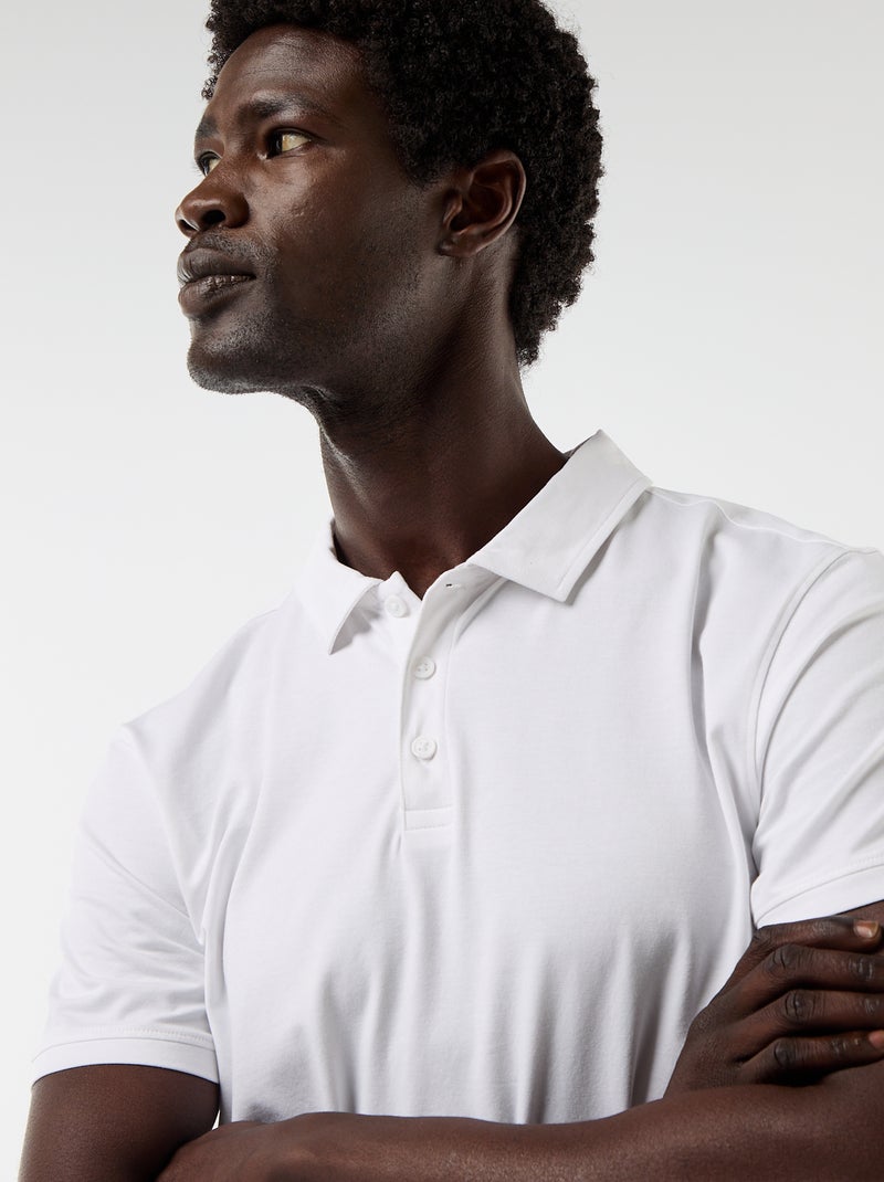 Polo em jersey com gola abotoada Branco - Kiabi