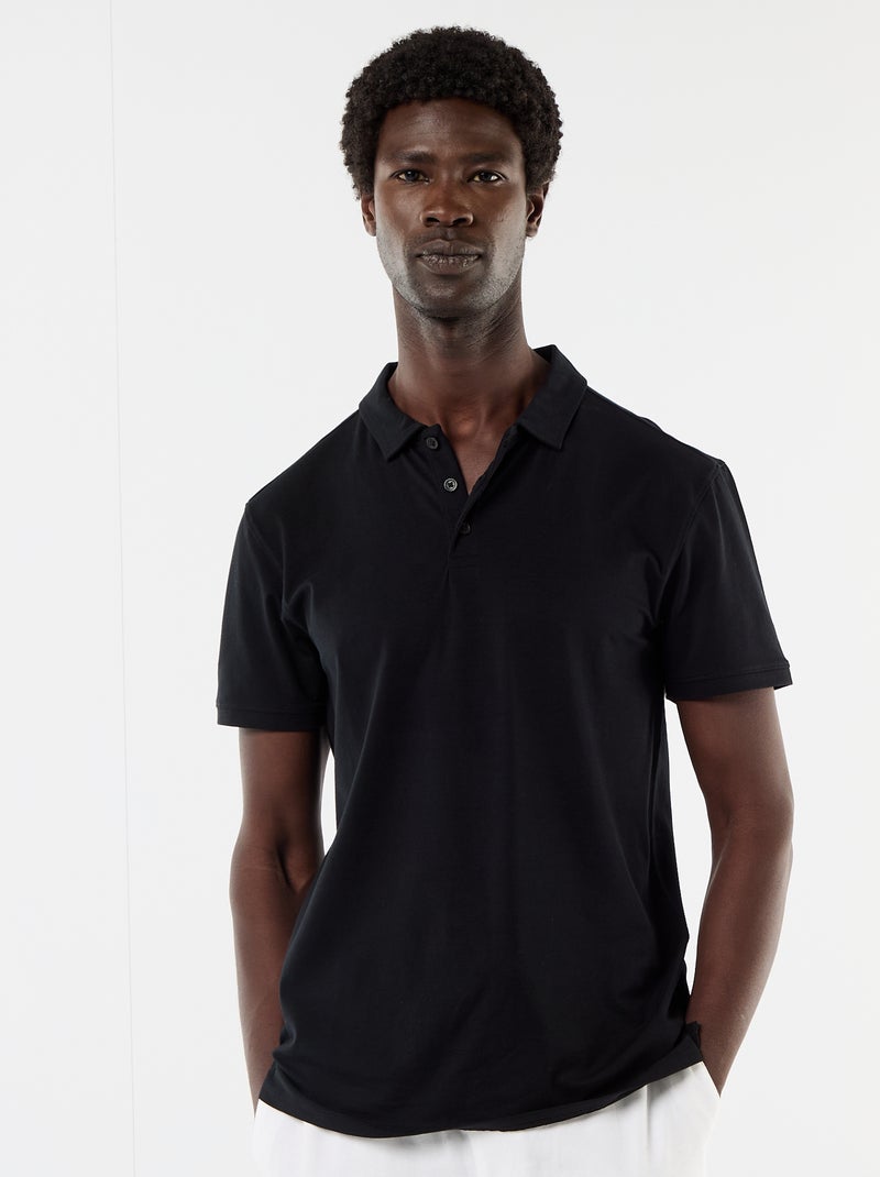 Polo em jersey com gola abotoada Preto - Kiabi