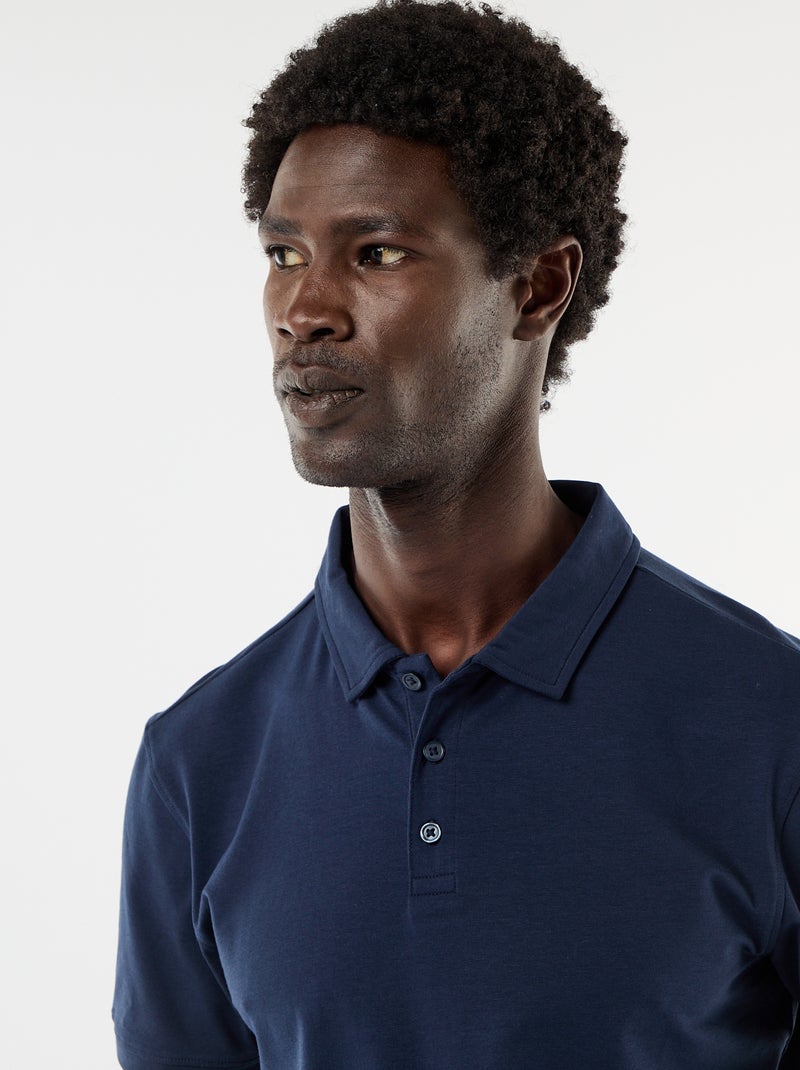 Polo em jersey com gola abotoada Preto - Kiabi