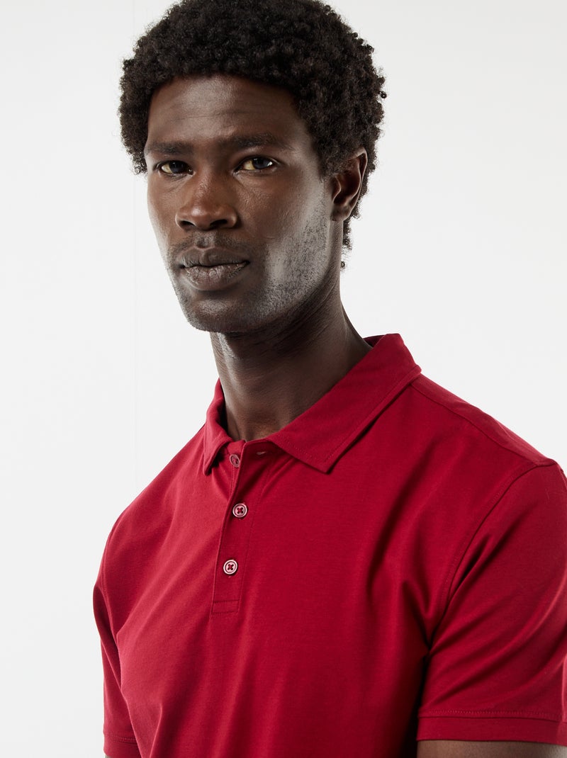 Polo em jersey com gola abotoada Vermelho - Kiabi