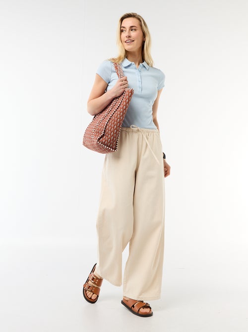 Polo em malha canelada com mangas curtas - Kiabi