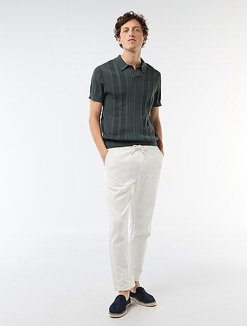 Polo em malha com efeito tricot