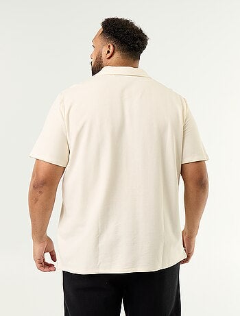 Polo em malha jersey de mangas curtas