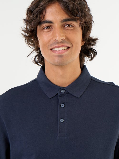 Polo em malha piqué de mangas compridas - Kiabi Polo em malha piqué de mangas compridas - Kiabi