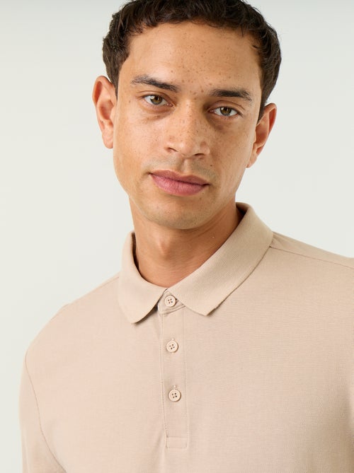 Polo em malha piqué de mangas compridas - Kiabi Polo em malha piqué de mangas compridas - Kiabi
