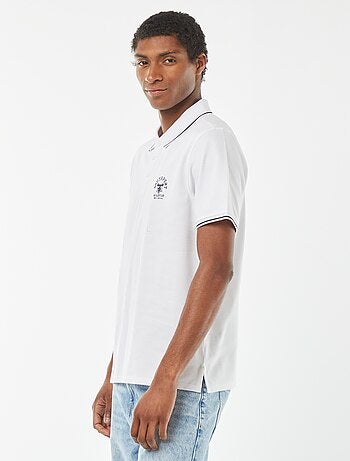 Polo em piqué de algodão com bordado frontal