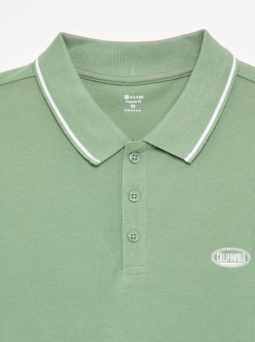 Polo em piqué de algodão com bordado frontal - Kiabi Polo em piqué de algodão com bordado frontal - Kiabi