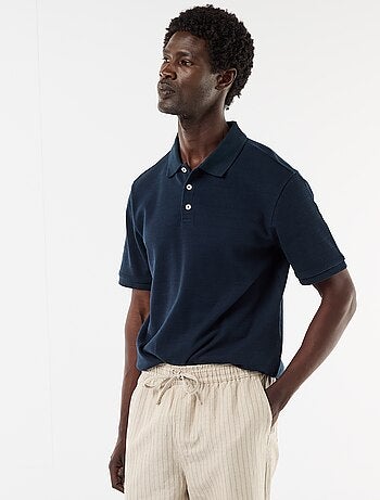 Polo em piqué de algodão com mangas curtas