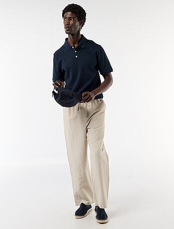 Polo em piqué de algodão com mangas curtas