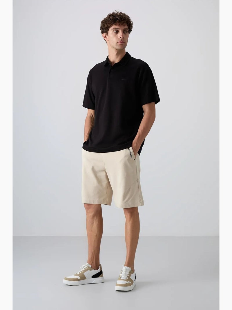 Polo largo tommy Preto - Kiabi