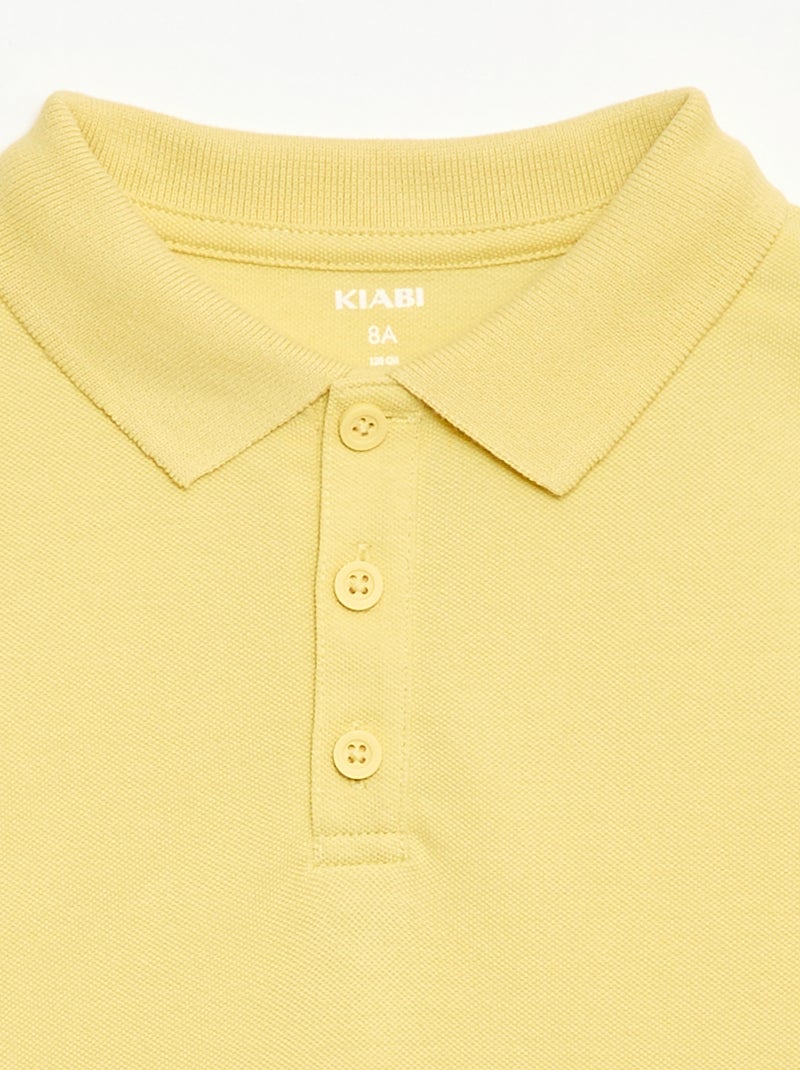 Polo liso em malha piqué Amarelo - Kiabi