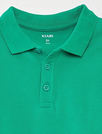 Polo liso em malha piqué