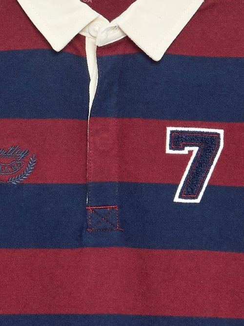 Polo listrado com gola contrastante - Kiabi Polo listrado com gola contrastante - Kiabi
