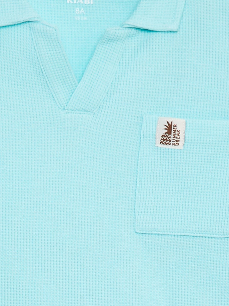 Polo loose com bolso CASTANHO - Kiabi