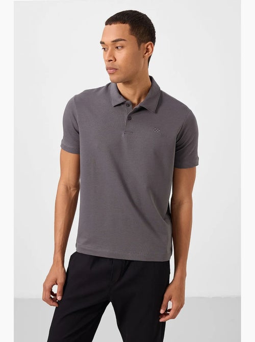 Polo t-shirt masculina em algodão e elastano tommy - Kiabi Polo t-shirt masculina em algodão e elastano tommy - Kiabi