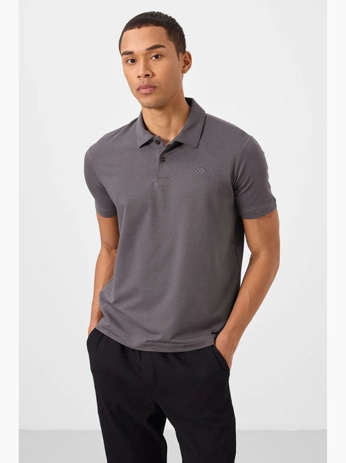 Polo t-shirt masculina em algodão e elastano tommy - Kiabi Polo t-shirt masculina em algodão e elastano tommy - Kiabi