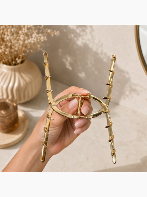 Prendedor caranguejo em metal com acabamento dourado - Kiabi